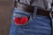 heart symbol at blue jeans pocket. anniversary concept