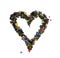 A heart symbol made from bronze colored shiny rocks and gems.