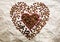 The heart symbol is made up of coffee beans.