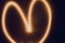 Heart track lighting blur orange illuminated lines