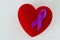 Heart with violet ribbon on white background - Concept of Domestic Violence awareness; Alzheimer`s disease, Pancreatic cancer,