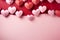 Heartfelt decor Red paper cut hearts on a pink backdrop