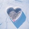 Heartfelt Ice: Aerial View of Enchanting Heart-shaped Skating Rink