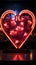 Heartfelt neon nostalgia Retro sign with vibrant hearts against black