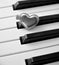 Hearth on piano keyboard music love concept passion art