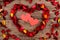 Hearts in centre of red potpourri heart