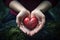 Hearts in hands symbolic gesture of affection Heart in woman hands Love giving, care, health, protection