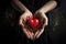 Hearts in hands symbolic gesture of affection Heart in woman hands Love giving, care, health, protection