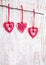 Hearts hanging on a twig