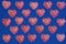 Hearts red on blue frame background, Saint Valentine holiday.