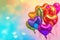 Heartshaped Balloons Floating In The Air Vibrant Rainbow Palette Against Pastel Background