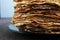 Hearty beautiful pancakes on wooden table