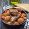 Hearty beef stew with carrot, celery, shallot and potato, square