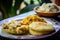 hearty breakfast of freshly-made arepas and eggs