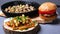 Hearty delicious rustic lunch. french fries burger and fried mushrooms champignon in cast iron on forest wooden coasters