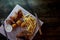 Hearty, fatty dish to the table.Cheese balls, fries and garlic croutons. Beer