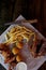 Hearty, fatty dish to the table.Cheese balls, fries and garlic croutons. Beer