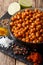 Hearty fried chickpeas with spices close-up. vertical