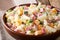 Hearty Hawaiian salad with pasta, ham, pineapple, onion, cheddar