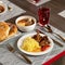 Hearty meals. Set lunch on restaurant dining table. Meat and vegetables Food. Square format or 1x1 for posting on social