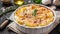 Hearty potato gratin with parmesan cheese, cream and delicious cured bacon from South Tyrol freshly served from the oven