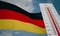 Heat wave in Germany, Thermometer in front of flag Germany and sky background, heatwave in Germany, Danger extreme heat in Germany