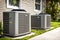 Heating and air conditioning units outside house. home improvement and climate solutions