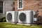Heating and air conditioning units outside house. outdoor units
