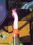 Heating a steel pipe with a blowtorch. The flame of a blowtorch