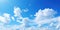Heavenly Canvas, Blue Sky Adorned with Fluffy White Clouds - Nature\\\'s Tranquil Beauty