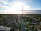 Heavenly Dawn: Church Cross Bathed in Sunrise Glow