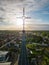 Heavenly Dawn: Church Cross Bathed in Sunrise Glow