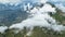 Heavenly Horizons: Aerial View of the Enchanting Mountain Panorama, Clouds, and Lush Green Forests