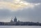 Heavenly landscape over St. Isaac`s Cathedral and the Admiralty from the opposite bank of the Neva River in St. Petersburg