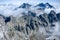 Heavenly Mountains view with blue sky and clouds