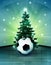 Heavenly space with soccer ball under glittering xmas tree