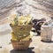 Heavy basket laden by pieces of natural sulfur to carry by miners from crater mine. Manual labour intensive sulphur