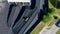 Heavy bulldozer pushing coal in electric power station, aerial view