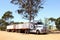 Heavy cargo trailer, Road train transport at the Lasseter Highway, Australia