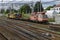 Heavy cargo vehicles on the railroad tracks. Top view