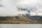 Heavy clouds over the arctic shore of the polar archipelago of Spitsbergen near Longyearbyen, Norway.