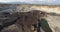 Heavy coal loaded dump truck, open mining pit