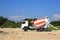 Heavy concrete truck on construction site