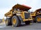 Heavy dump truck for transportation of goods in a quarry.