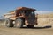 Heavy dumper truck working on a construction site