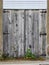 Heavy-duty unpainted wooden shed door abstract background