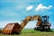 Heavy earth mover and blue sky, excavator machine