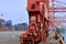 Heavy equipment in container yard beside dock, Xiamen, China