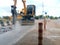 Heavy equipment is working Excavate construction material from the area under the bridgeBlurred images