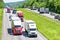 A heavy flow of 18-wheelers peppered with cars and SUVs roll down a Tennessee interstate highway